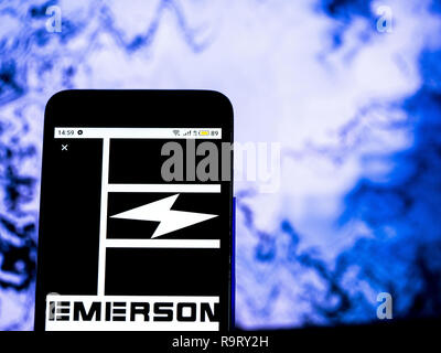 December 18, 2018 - Kiev, Ukraine - Emerson Electric Manufacturing company logo seen displayed on a smart phone. (Credit Image: © Igor Golovniov/SOPA Images via ZUMA Wire) Stock Photo