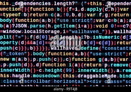 Javascript functions, variables, objects. Monitor closeup of function source code. IT specialist workplace. Big data and Internet of things trend. HTM Stock Photo