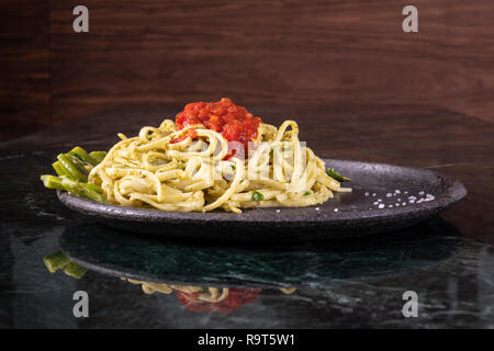 Spaghetti carbonara on marble plate. Closeup Stock Photo