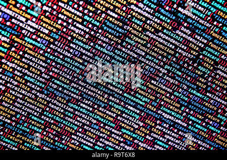 Software developer programming code on computer. Abstract computer script source code. Shallow depth of field, selective focus effect Stock Photo