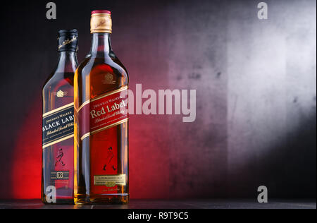 POZNAN, POL - NOV 15, 2018: Bottles of Johnnie Walker, the most widely distributed brand of blended Scotch whisky in the world with sales of over 130  Stock Photo