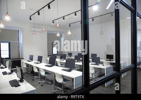 Many computers in computer room, classroom. Selective Focus Stock Photo