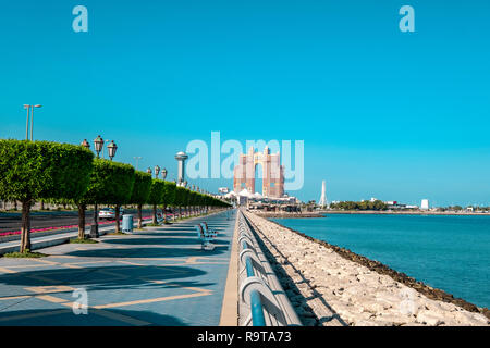 Perspective view of the Abu Dhabi Corniche promenade with view to Marina island. Stock Photo