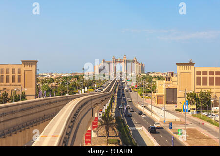 DUBAI, UAE - NOV 12, 2018: Atlantis hotel view from monorail train on  man-made island Palm Jumeirah in Dubai, UAE. This monorail is the longest compl Stock Photo