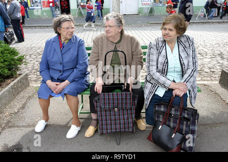 Three senior women on a bench Stock Photo