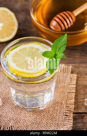 Honey and Lemon Drink. Detox water with honey lemon and mint