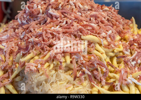 Finger-shaped potato dumplings, Schupfnudeln with cabbage and bacon on the Baden-Baden Christmas market, Baden-Baden, Baden-Wuerttemberg, Germany, Eur Stock Photo