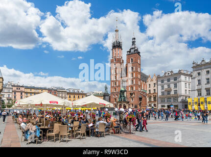 Cafe in front of St Mary's Basilica in the Main Square ( Rynek Główny ), Kraków, Poland Stock Photo