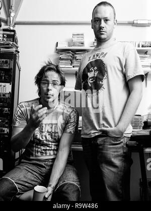 Basement Jaxx, English Electronic duo Felix Buxton and Simon Ratcliffe photographed at their Brixton Studio, August 2003.London, England, United Kingdom. Stock Photo