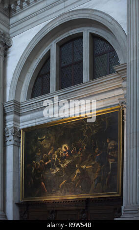 Painting 'Last Supper' by Venetian Renaissance painter Jacopo Robusti called Tintoretto (1592-1594) on display in the Church of San Giorgio Maggiore (Basilica di San Giorgio Maggiore) on the Island of San Giorgio Maggiore in Venice, Italy. Stock Photo