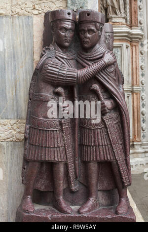 Portrait of the Four Tetrarchs. Porphyry sculptural group of four Roman emperors dated from around 300 AD fixed to a corner of the façade of Saint Mark's Basilica (Basilica di San Marco) in Venice, Italy. Stock Photo