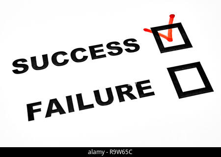 Success and failure check boxes on white sheet tick on success Stock Photo