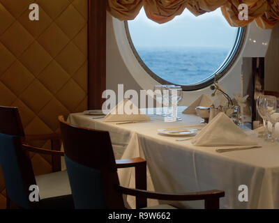 Romantic Dinner table set with sea view Stock Photo
