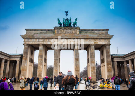 BERLIN, GERMANY - MARCH, 2018: The Brandenburg Gate viewed from the Pariser Platz on the East side in a cold end of winter day Stock Photo