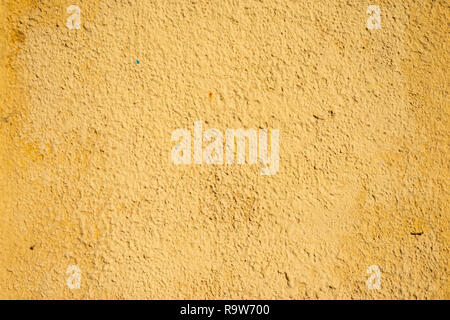 highly detailed yellow color stucco wall background Stock Photo