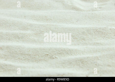 the texture of the beach sand is yellow. sandy. Stock Photo