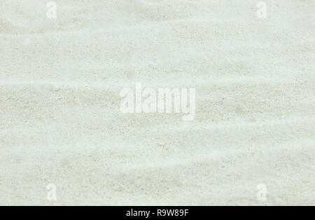 the texture of the beach sand is yellow. sandy. Stock Photo