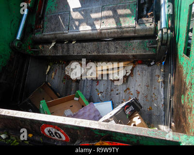 Waste trucks and bins at the market of Turin Stock Photo