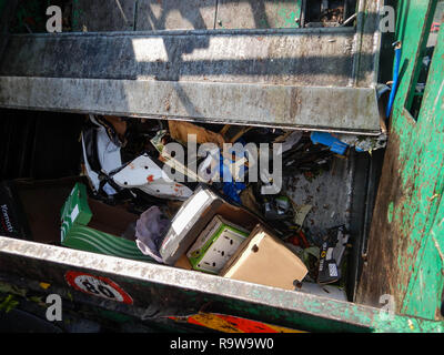 Waste trucks and bins at the market of Turin Stock Photo