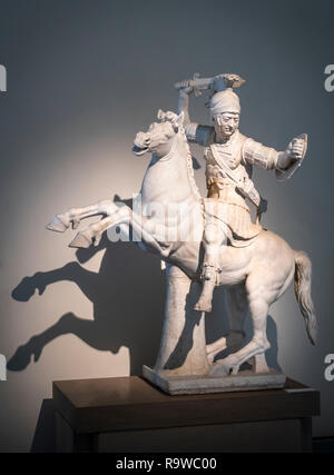 A marble sculpture of a Warrior on horseback. A 2nd cen. AD Roman copy of a 2nd cen BC Greek sculpture. In the National Archaeological Museum at Naple Stock Photo