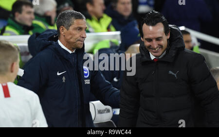 Brighton manager Chris Hughton with Arsenal Head Coach Unai Emery during the Premier League match between Brighton & Hove Albion and Arsenal at the American Express Community Stadium. 26 December 2018 Photo Simon Dack/Telephoto Images.   Editorial use only. No merchandising. For Football images FA and Premier League restrictions apply inc. no internet/mobile usage without FAPL license - for details contact Football Dataco Stock Photo