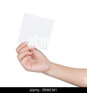 Female hand holding blank sheet of paper isolated on white Stock Photo