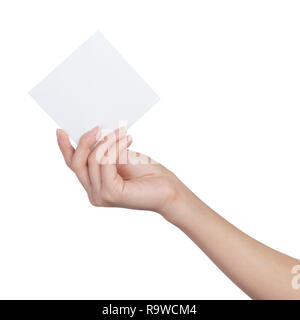 Female hand holding blank sheet of paper isolated on white Stock Photo