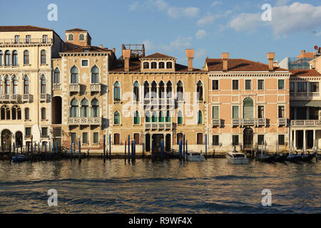 Palazzo Contarini Fasan, also known as the Casa di Desdemona (House of Desdemona), Palazzo Venier Contarini and Palazzo Michiel Alvisi pictured from left to right on the Grand Canal (Canal Grande) in Venice, Italy. Palazzo Ferro Fini is seen at the left. Stock Photo