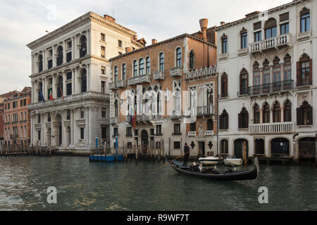 Palazzo Grimani di San Luca (L) and Palazzo Corner Contarini dei Cavalli (R) on the Grand Canal (Canal Grande) in Venice, Italy. Palazzo Grimani di San Luca was designed by Venetian architect Michele Sanmicheli and completed by Gian Giacomo de' Grigi in the 16th century. Palazzo Tron a San Beneto is seen in the foreground at the right. Stock Photo