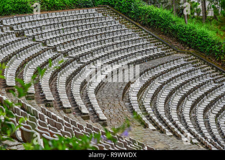 The grandstands of a modern outdoor amphitheater, a stage for small entertaining events, performances, concerts or presentations. Stock Photo