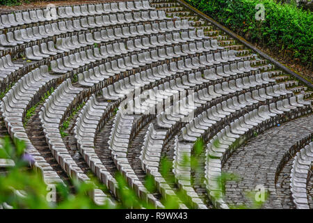 The grandstands of a modern outdoor amphitheater, a stage for small entertaining events, performances, concerts or presentations. Stock Photo