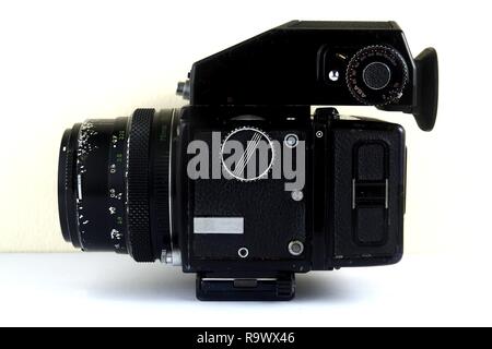 A vintage medium format film camera shot white background. Stock Photo