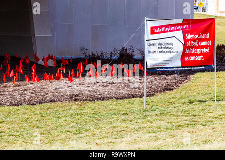 Millersville, PA, USA - February 22, 2016:  Silence, in and of itself, cannot be interpreted as Consent banner, along with red flags, at the Millersvi Stock Photo