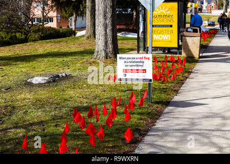 Millersville, PA, USA - February 22, 2016:  Students are reminded that if they see red flags in a dating relationship to seek help. Stock Photo