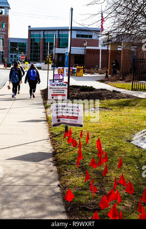 Millersville, PA, USA - February 22, 2016:  Students are reminded that if they see red flags in a dating relationship to seek help. Stock Photo