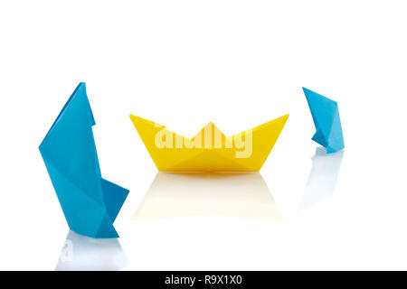 Sinking Ship Origami Tutorial Sinking ships, origami concept Stock Photo - Alamy