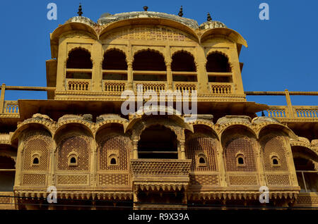 Traditional Rajasthani haveli with a decorated window at Patwon ki haveli in Jaisalmer, Rajasthan, India. Stock Photo