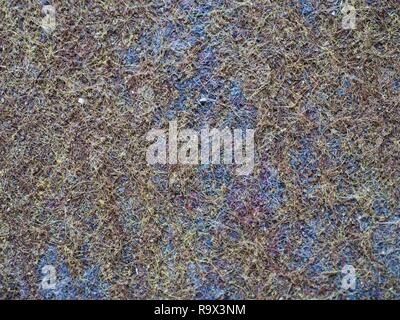 Gray brown woolen texture from worn carpet on house floor. Texture of textile rug with striped pattern Stock Photo