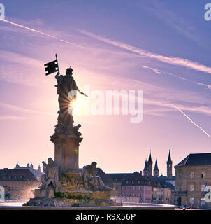 The fountain statue in front of the prince bishop residence of Wurzburg. Symbol of Franconia free state Bavaria Germany. Travel destination summer sun Stock Photo