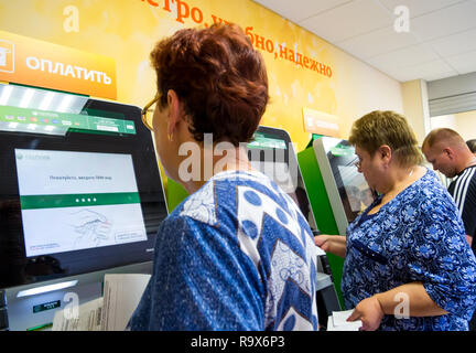 Voronezh, Russia - July 14, 2018: Payment of utilities using payment terminals Stock Photo
