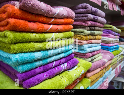 Voronezh, Russia - July 14, 2018: A stack of terry towels on the shop counter Stock Photo