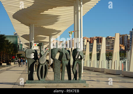 Bronze modern abstract statue depicting a band of musicians in the paseo del muelle uno promenade in on a sunny day Malaga Stock Photo