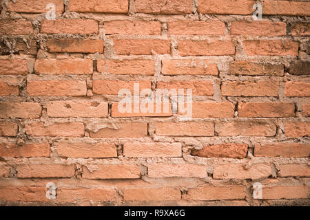 Old orange brick wall textured background. Stock Photo