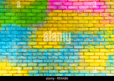 Colorful painted brick wall texture background. Graffiti brick wall, colorful background. Stock Photo