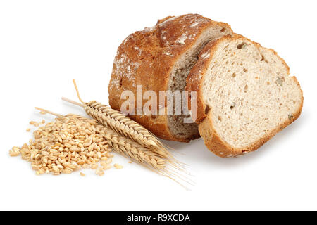 Sliced bread loaf with wheat ears and grains isolated on white background Stock Photo