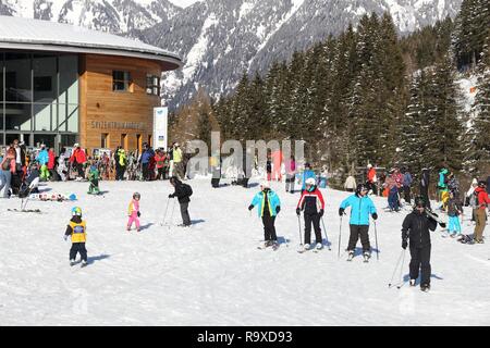 BAD HOFGASTEIN, AUSTRIA - MARCH 9, 2016: People visit Angertal ski station in Bad Hofgastein. It is part of Ski Amade, one of largest ski regions in E Stock Photo