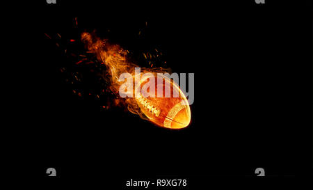 American football ball in fire on black. game concept. Mixed media Stock Photo