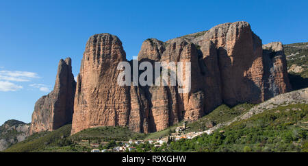 In the prepyrenees, northern Spain, some amazing vertical rocks called Mallos de Riglos. Popular for rock climbing. Stock Photo
