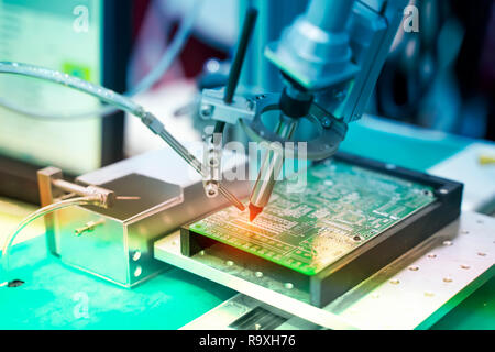 soldering iron tips of automated manufacturing soldering and assembly pcb board Stock Photo