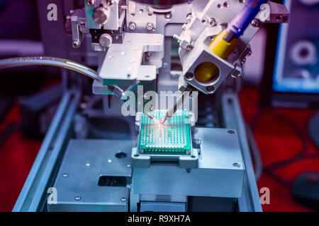 soldering iron tips of automated manufacturing soldering and assembly pcb board Stock Photo